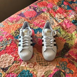 Adidas White and Black Athletic Shoes.Shoe box not included.